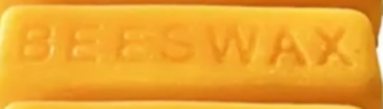 Picture of 1 ounce beeswax.  Yellow. 