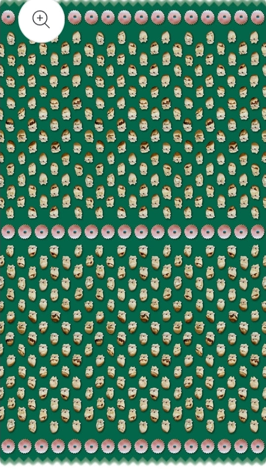 Close-up of a green fabric with a pattern of  elk teeth.